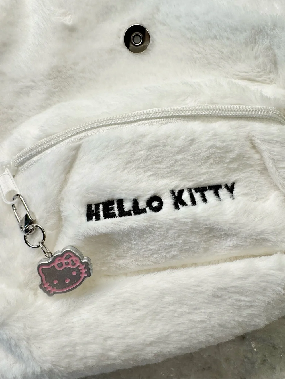 New Women’s Hello Kitty Embroidered White Faux Fur Mini Backpack Purse w/ Charm